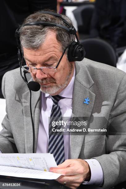 Analyst, P.J. Carlesimo reads his notes during Game Seven of the Western Conference Quarterfinals between the Utah Jazz and the LA Clippers during...