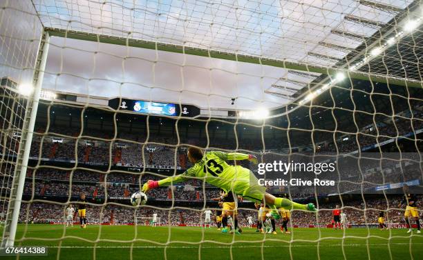 Jan Oblak of Atletico Madrid makes a save during the UEFA Champions League semi final first leg match between Real Madrid CF and Club Atletico de...