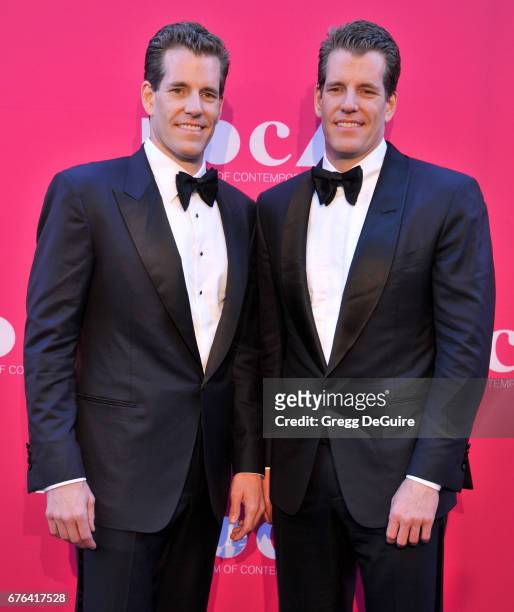 Cameron Winklevoss and Tyler Winklevoss arrive at the MOCA Gala 2017 at The Geffen Contemporary at MOCA on April 29, 2017 in Los Angeles, California.