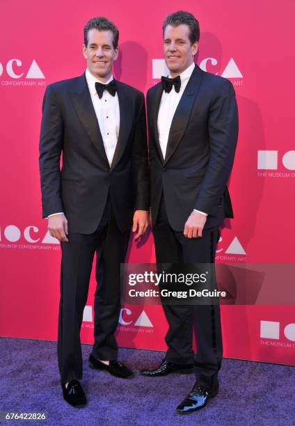 Cameron Winklevoss and Tyler Winklevoss arrive at the MOCA Gala 2017 at The Geffen Contemporary at MOCA on April 29, 2017 in Los Angeles, California.