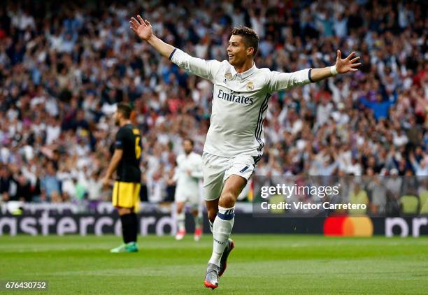 Cristiano Ronaldo of Real Madrid celebrates after scoring the opening goal during the UEFA Champions League Semi Final first leg match between Real...