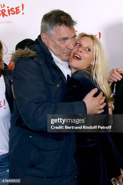 Actors Jean-Marie Bigard and Florence Thomassin attend the "Vive la Crise" Paris Premiere at Cinema Max Linder on May 2, 2017 in Paris, France.
