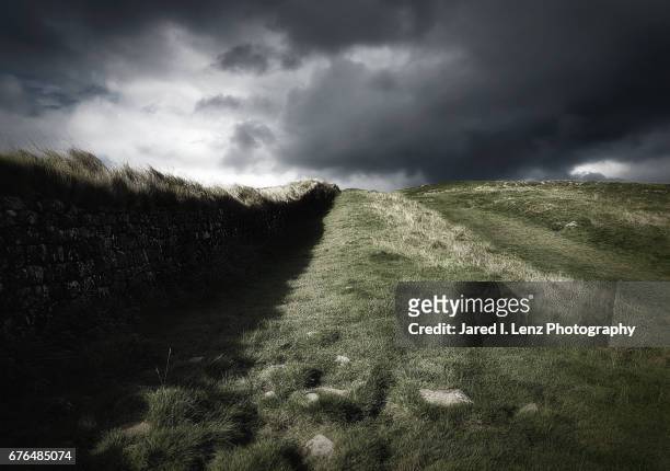 storm's coming over hadrian's wall - centurione stock pictures, royalty-free photos & images