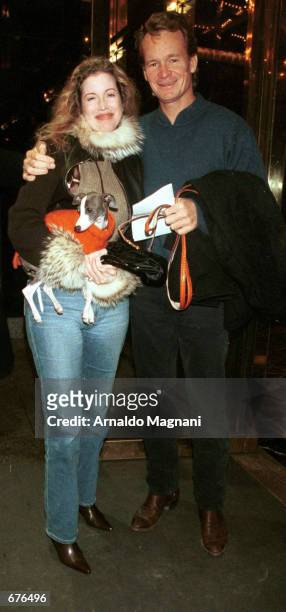 Real estate mogul Zack Bacon Jr. And Diandra Douglas check into a hotel January 13, 2001 in New York City.
