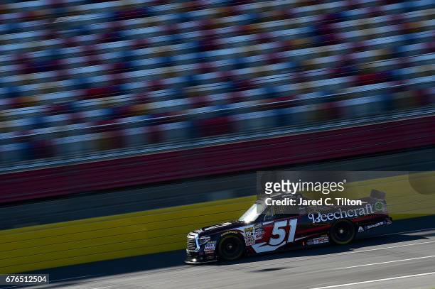 Kyle Busch drives the Kyle Busch Motorsports Toyota during the NASCAR Camping World Truck Series test session at Charlotte Motor Speedway on May 2,...