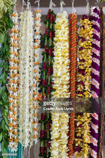 flower lei for sale at merrie monarch festival in hilo hawaii - merrie stock pictures, royalty-free photos & images