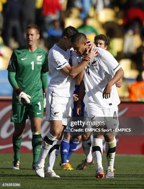 New Zealand's Winston Reid and Tommy Smith celebrate after the final whistle.