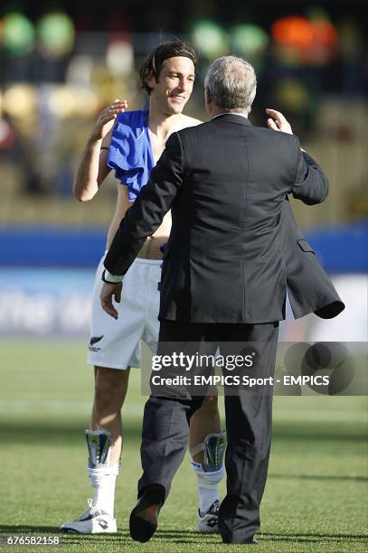 New Zealand's Ivan Vicelich with their head coach Riki Herbert .