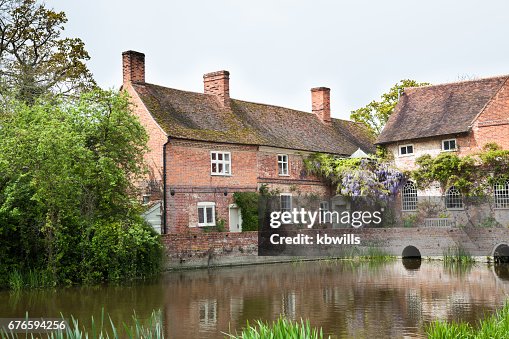 Chilly springtime sun on famous beauty spot and tourist destination on River Stour in Essex England Chilly springtime sun on famous beauty spot and tourist destination on River Stour in Essex England