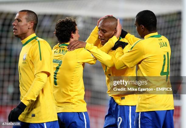 Brazil's Sisenando Maicon celebrates with his team mates after scoring his sides first goal of the game