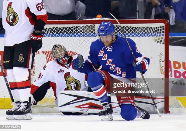 Michael Grabner of the New York Rangers celebrates his first-period goal against Craig Anderson of the Ottawa Senators in Game Three of the Eastern...