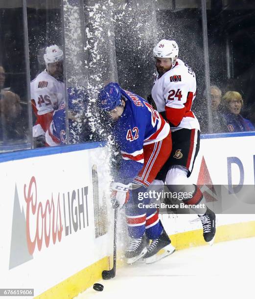 Viktor Stalberg of the Ottawa Senators hits v42 during the first period in Game Three of the Eastern Conference Second Round during the 2017 NHL...