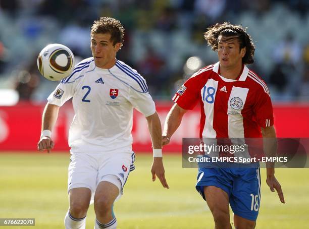 Slovakia's Peter Pekarik and Paraguay's Nelson Haedo Valdez battle for the ball