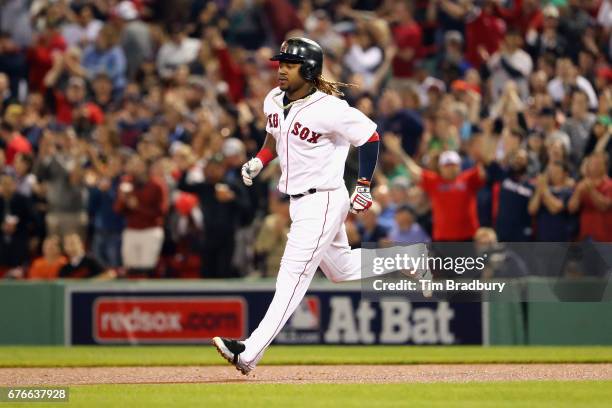 Hanley Ramirez of the Boston Red Sox runs the bases after hitting a solo home run during the fourth inning against the Baltimore Orioles at Fenway...
