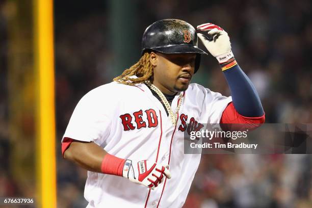 Hanley Ramirez of the Boston Red Sox runs the bases after hitting a solo home run during the fourth inning against the Baltimore Orioles at Fenway...