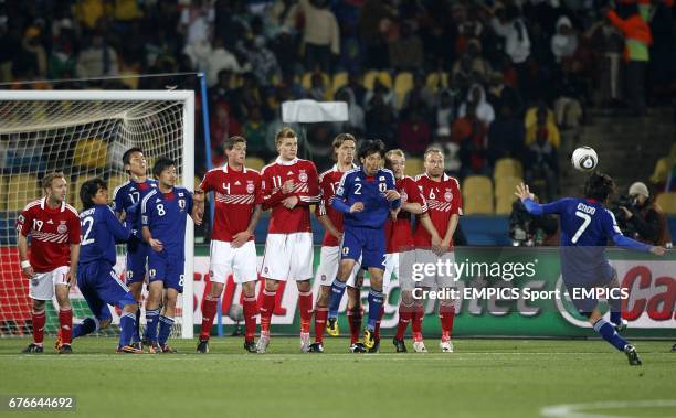 Japan's Yasuhito Endo scores his sides second goal of the game from a free kick