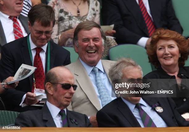 Sir Terry Wogan and his wife Lady Helen in the stands behind HRH The Duke of Kent and Tim Phillips