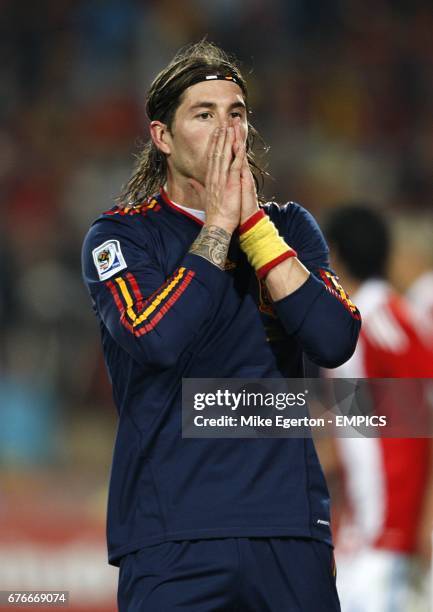 Spain's Garcia Sergio Ramos reacts after his team mate Xabi Alonso missed a penalty.