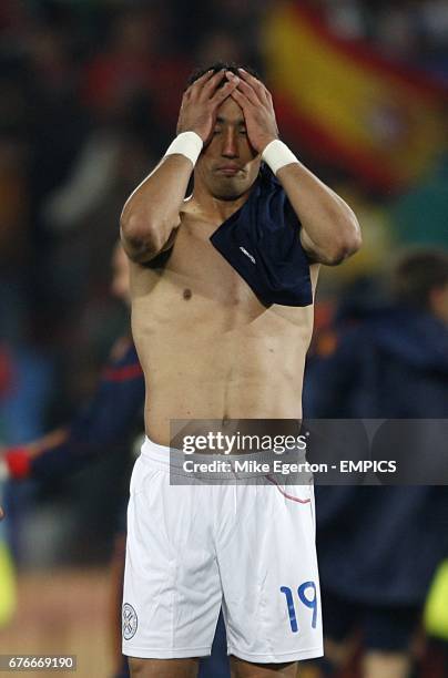 Paraguay's Lucas Barrios appears dejected after the final whistle.