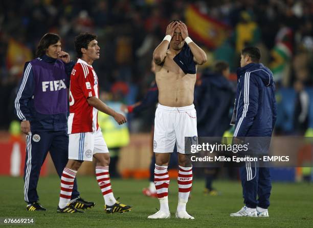 **Alternative crop** Paraguay's Lucas Barrios appears dejected after the final whistle.