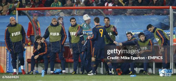 Spain's Fernando Torres is substituted during game against Paraguay