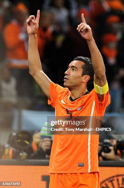 Netherland's Giovanni Van Bronckhorst celebrates scoring his sides first goal of the game