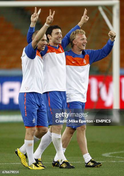 Netherlands' Arjen Robben, Mark van Bommel and Dirk Kuyt at todays training session at Soccer City