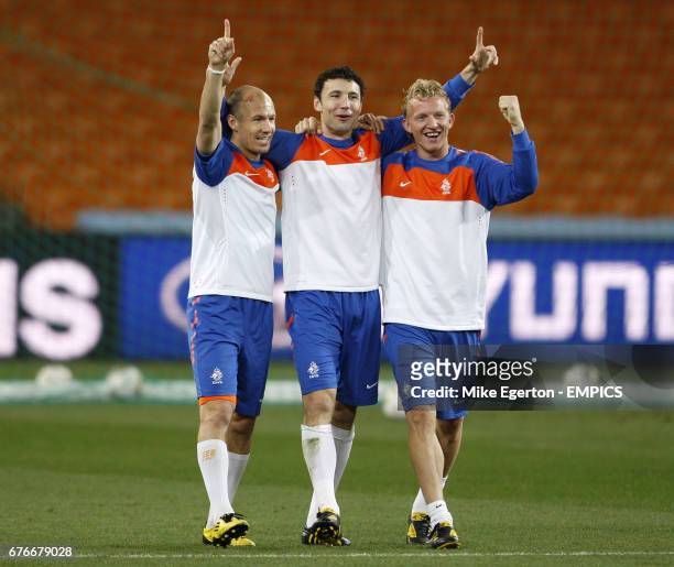 Netherlands' Arjen Robben, Mark van Bommel and Dirk Kuyt at todays training session at Soccer City