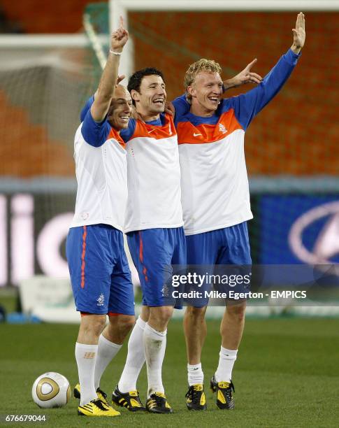 Netherlands' Arjen Robben, Mark van Bommel and Dirk Kuyt at todays training session at Soccer City