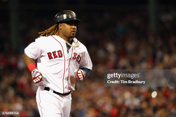 Hanley Ramirez of the Boston Red Sox runs the bases after hitting a solo home run during the sixth inning against the Baltimore Orioles at Fenway...