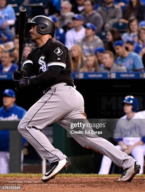 Geovany Soto of the Chicago White Sox hits a sacrifice fly in the third inning against the Kansas City Royals at Kauffman Stadium on May 2, 2017 in...