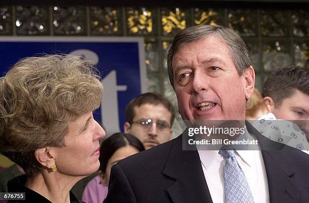 Former U.S. Senator John Ashcroft gives his concession speech as wife Janet stands by his side, on November 8, 2000 in St Louis, MO. Ashcroft begins...