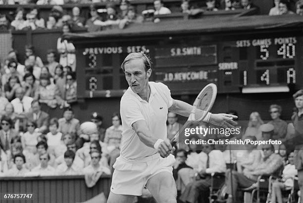 American tennis player Stan Smith pictured in action competing to lose the final of the Men's Singles tournament against Australian tennis player...