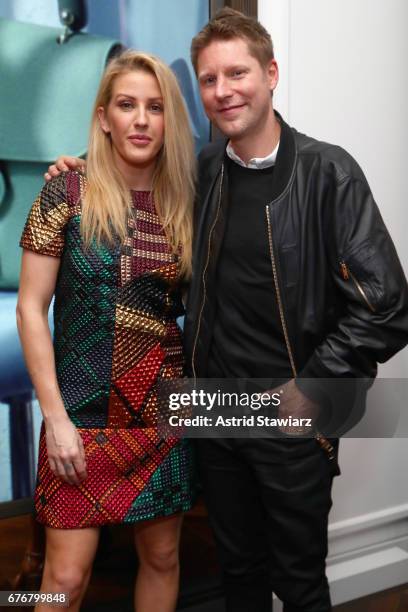 Musician Ellie Goulding and Burberry CEO Christopher Bailey attend the launch of the Burberry DK88 Bag hosted by Christopher Bailey at Burberry Soho...