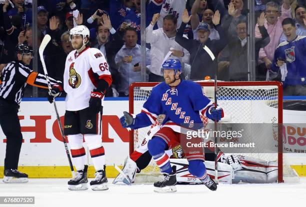 Michael Grabner of the New York Rangers celebrates his first-period goal against Craig Anderson of the Ottawa Senators in Game Three of the Eastern...