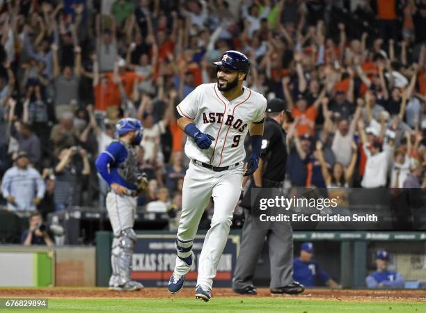 Marwin Gonzalez of the Houston Astros smiles as he rounds the bases after hitting a grans slam during the eighth inning against the Houston Astros at...