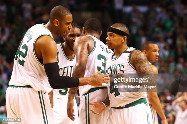 Al Horford of the Boston Celtics talks with Isaiah Thomas during overtime of the Celtics 129-119 win over the Wizards in Game Two of the Eastern...