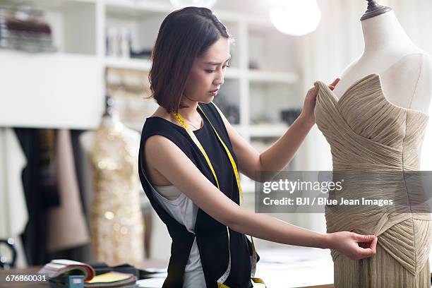 fashion designer working in studio - mannequin drawings stock pictures, royalty-free photos & images