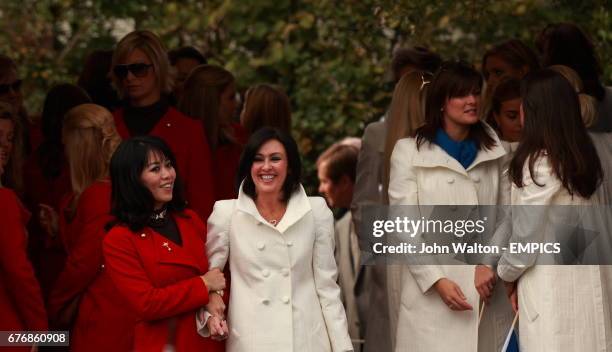 S Lisa Pavin and Europe's Gaynor Montgomerie share a laugh prior to the start of the opening ceremony