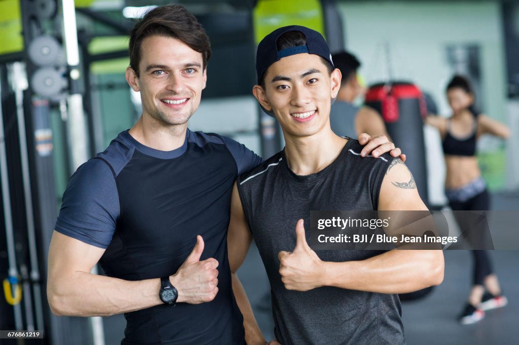 Portrait of young man and his personal coach