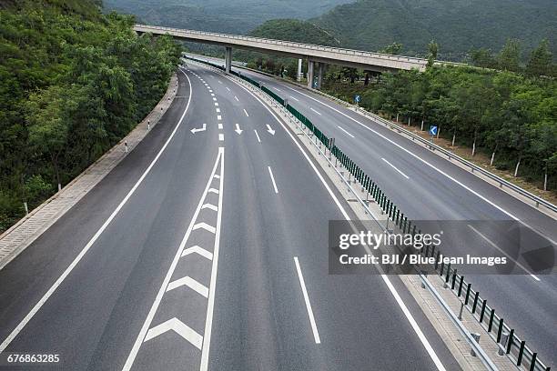 road and mountains in beijing, china - forward arrow stock pictures, royalty-free photos & images