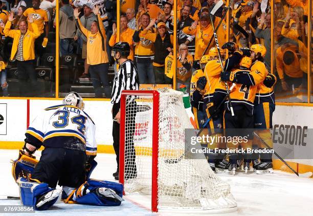 Jake Allen of the St. Louis Blues gets off the ice after giving up a goal to Ryan Ellis of the Nashville Predators during the third period of Game...