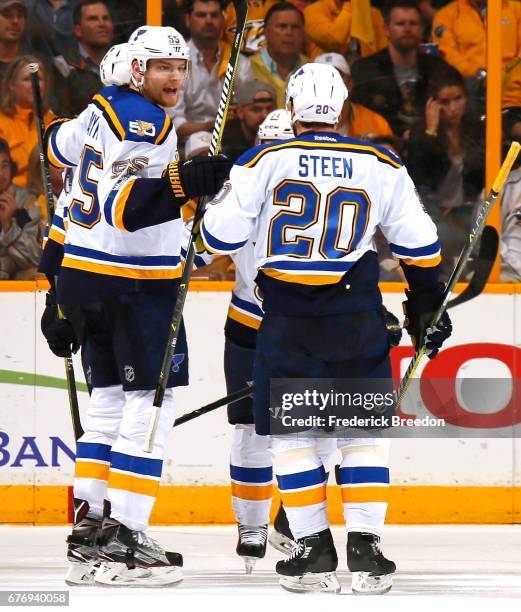 Colton Parayko and Alexander Steen of the St. Louis Blues celebrate a late goal during the third period of Game Four of the Western Conference Second...
