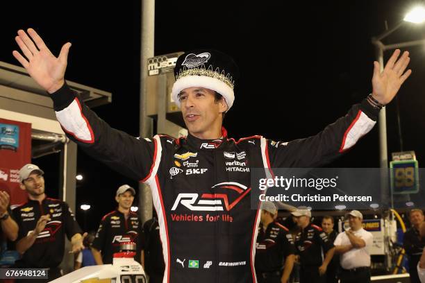 Helio Castroneves of Brazil, driver of the Team Penske Chevrolet celebrates after winning the Verizon P1 Pole Award and earning 'speed king' title...