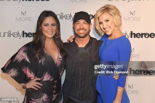 Singer-songwriter Sara Evans, CMT Host Cody Alan and actress Savannah Chrisley take photos on carpet for Unlikely Heroes hosts, Night of Freedom, A...