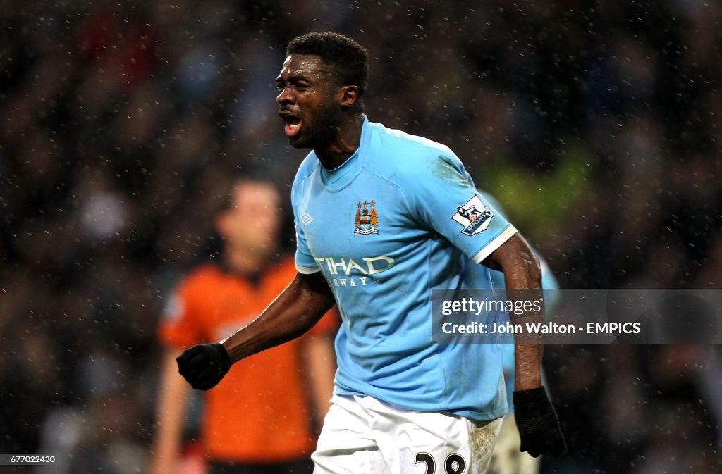 Manchester City's Kolo Toure celebrates after scoring his side's