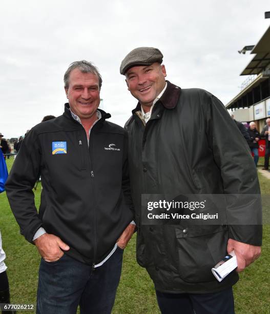 Former trainer Peter Moody and now owner poses with Darren Weir after combining to win with Ulmann in Race 8, Wangoom Handicap during the Warrnambool...