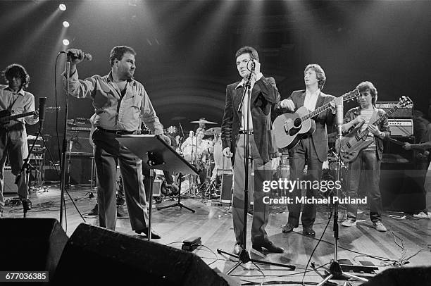 An all-star lineup performing on stage at a charity concert for ARMS , held at the Royal Albert Hall, London, 20th September 1983. Left to right:...