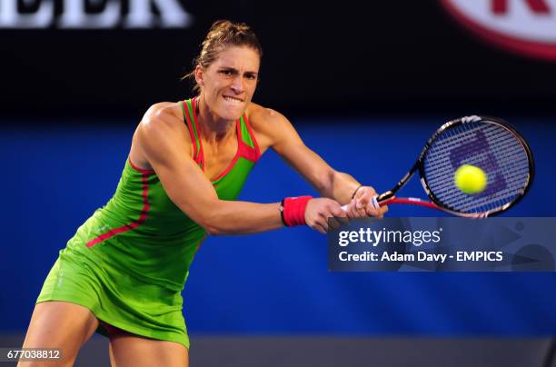 Germany's Andrea Petkovic in action against Russia's Maria Sharapova