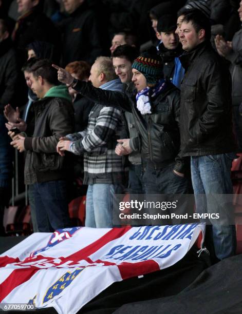 General view of Brighton & Hove Albion fans in the stands.